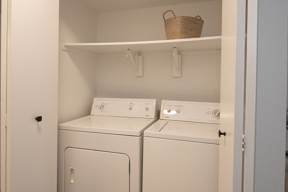 a white washer and dryer in a room&#xA0;at THE ARLO, Citrus Heights, California
