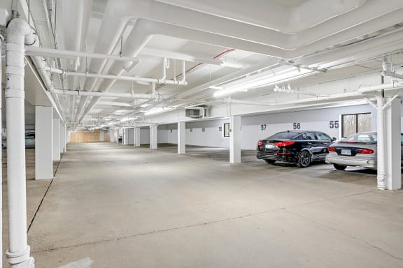 a parking garage with cars parked in it