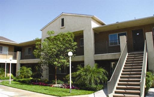 Exterior of building, 2 story, outside staircase