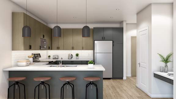 A modern kitchen with a bar stool and a refrigerator.