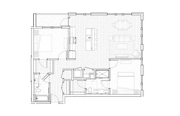 A floor plan of a house with a kitchen, living room, and two bedrooms.