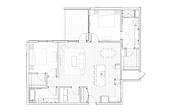 A floor plan of a house with a kitchen, living room, and two bedrooms.