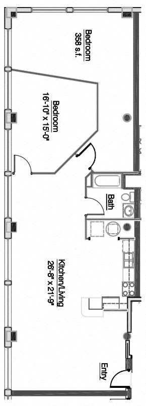 A floor plan of a house with two bedrooms, a kitchen, and an entryway.