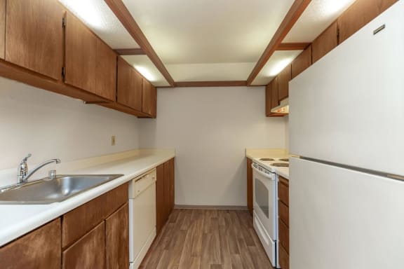 Kitchen With refrigerator at Villas at Hannover, Stockbridge, GA,30281
