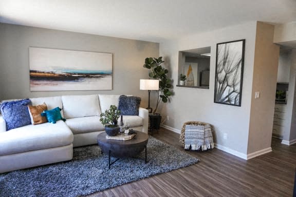 a living room with a couch and a table