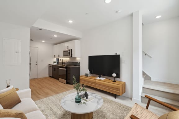 a living room with a couch and a television