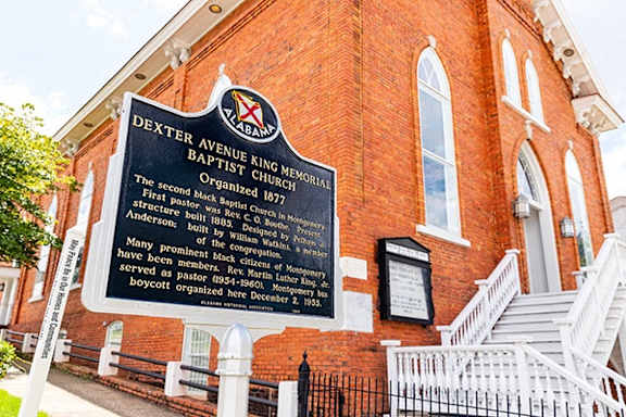 a sign outside and memorial baptist chapel