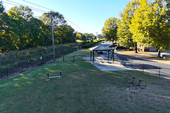a park with a playground and a picnic table