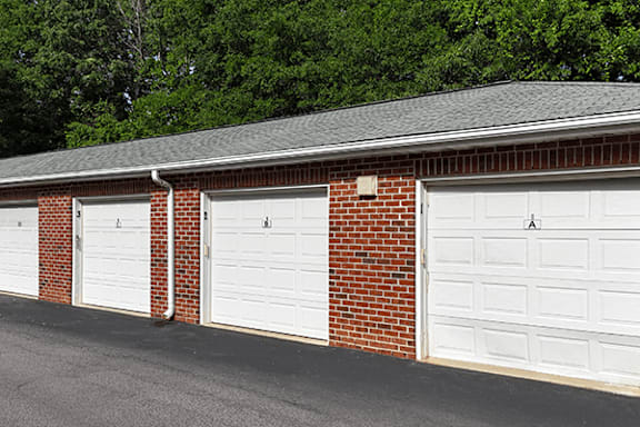 A row of garage doors are closed.