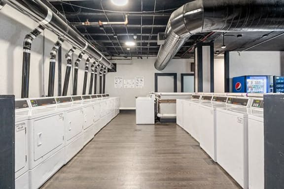 a large room with many white dividers in it