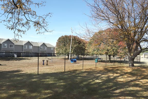fenced in dog park at cross creek apartments and townhomes