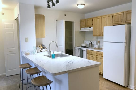 Kitchen with refrigerator and oven