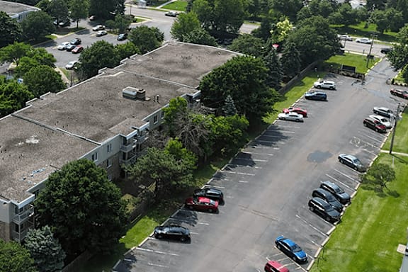 A parking lot with cars parked in it.