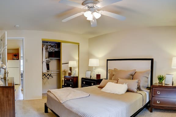 spacious bedrooms with overhead fan