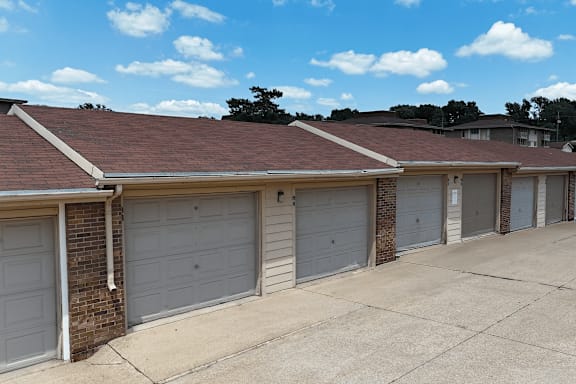 A row of garage doors are closed.