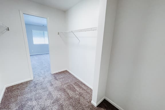 bedroom with large walk-in closet at huntington glen apartments