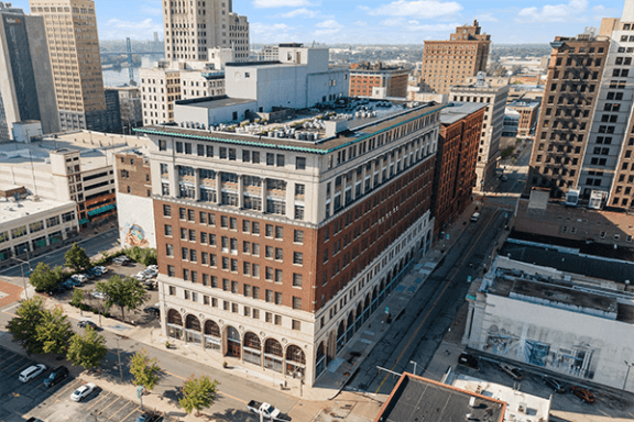 an aerial view of a large building in a city