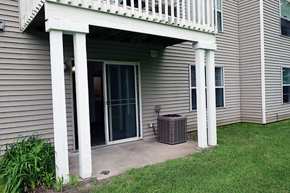 A house with a porch and a window.
