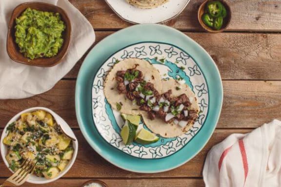 a plate of food on a wooden table