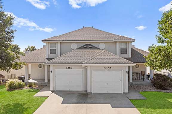 A house with the number 3355 on the garage door.