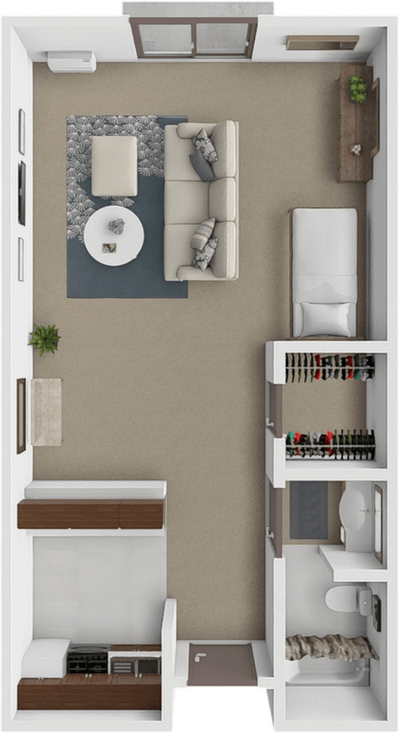 A small apartment with a bed, a couch, a table, and a shelf with various items.