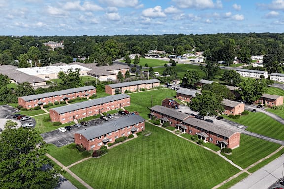 A large grassy area with a building in the middle.
