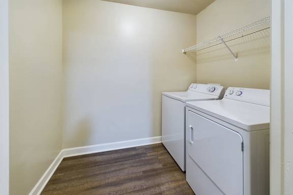 A laundry room with a washer and dryer.
