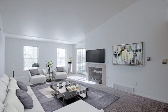 a living room with a couch and a coffee table