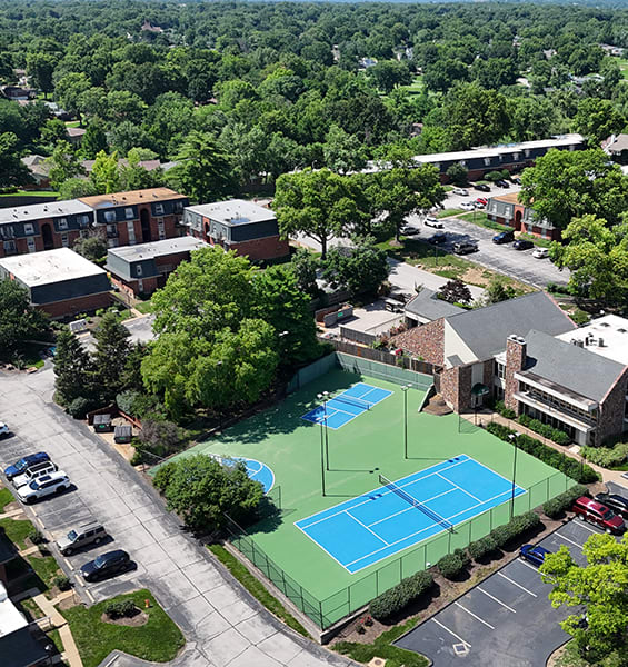 apartment building overlooks a lake