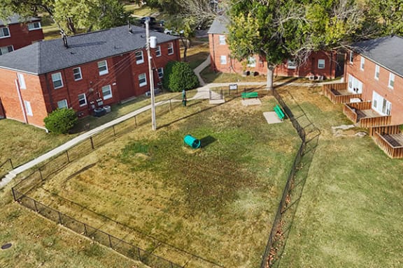 an aerial view of a yard in front of a house