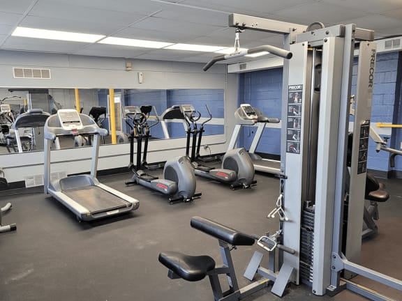 a gym with weights and other exercise equipment