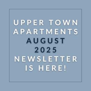 a gray background with a blue border and the words upper town apartments august 23 newsletter is