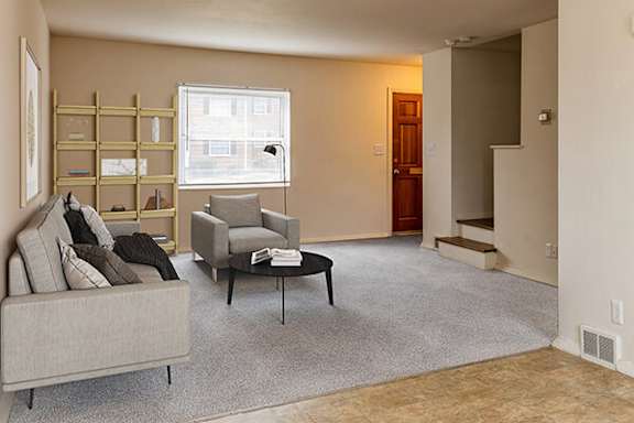 a living room with a couch and a coffee table