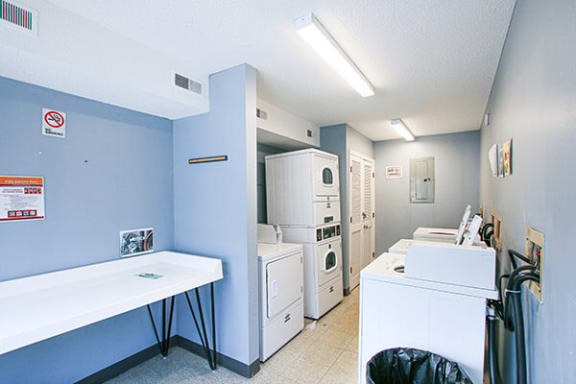 a laundry room with a washer and dryer