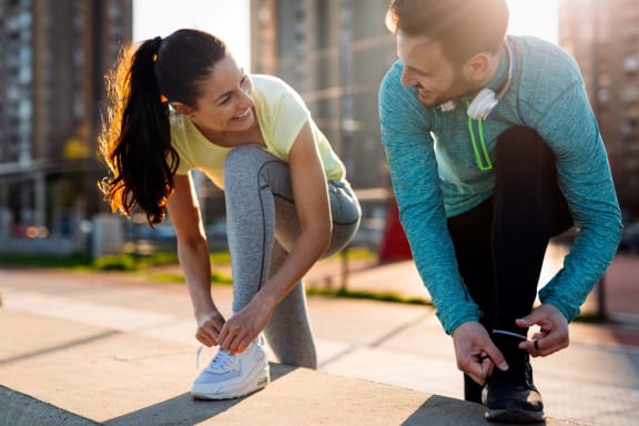 Two friends about to go for a jog