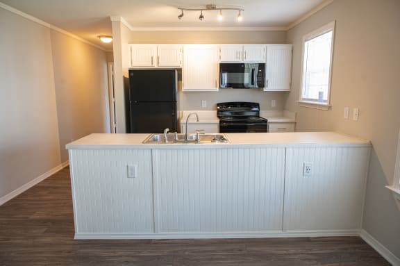 Built-in microwave in your home at Deerbrook Apartments in Wilmington, NC 28405