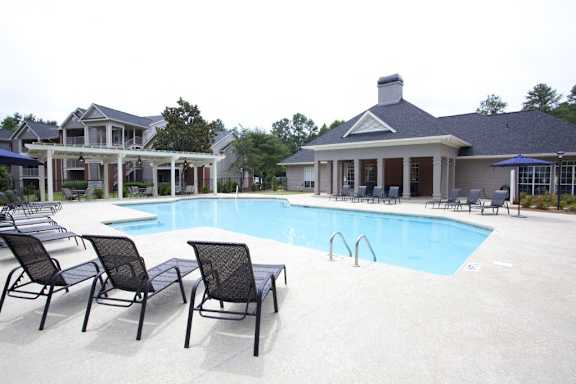 our apartments have a large pool and lounge chairs