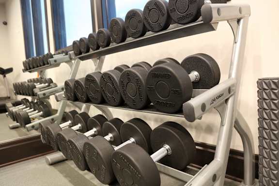 Fitness w/ free weights at Regency Place, Oakbrook Terrace