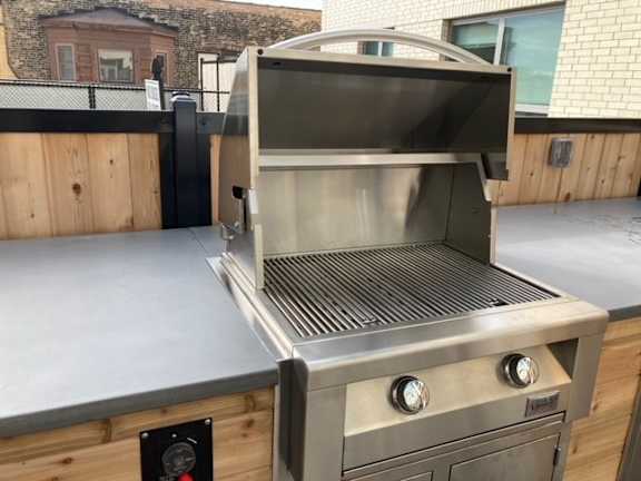 BBQ Area at Lakeview 3200 Apartments, Chicago, IL
