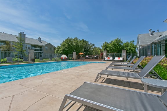 the reserve at city center apartments swimming pool and lounge chairs at Brookdale Lakes, Illinois