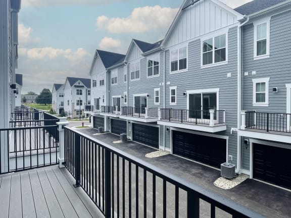 the view of a row of houses from a balcony at Enclave Crystal Lake Townhomes and Apartments, Crystal Lake, 60014