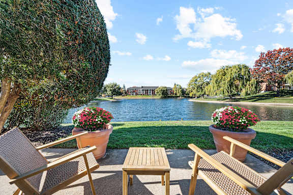 Apartment patio with serene views of the lake