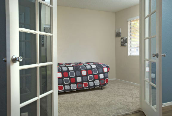Fifteen 50 Apartments Las Vegas, NV - 2 Bedroom 1 Bathroom Apartment - Bedroom with French Doors