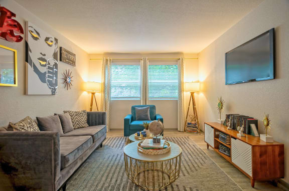 Apartments for Rent Nashville TN - The Canvas - Spacious Living Room with Hardwood-Inspired Flooring and Two Windows