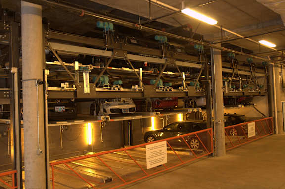 A sign in a parking garage indicates that the area is for "VIP".