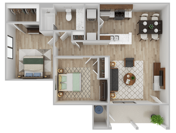 A top-down view of a small apartment with a kitchen, living room, and bedroom.