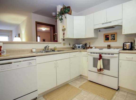 Bright white kitchens at Westminster Senior Apartment Homes