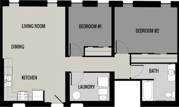 A floor plan of a small apartment with a living room, dining area, kitchen, laundry room, and two bedrooms.