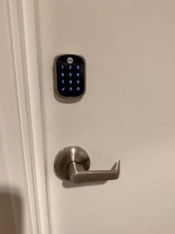 A door handle with a keypad on it.