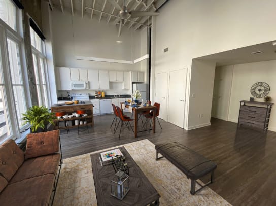 a view of a living room and kitchen in an apartment at Lofts at Union Alley, Memphis